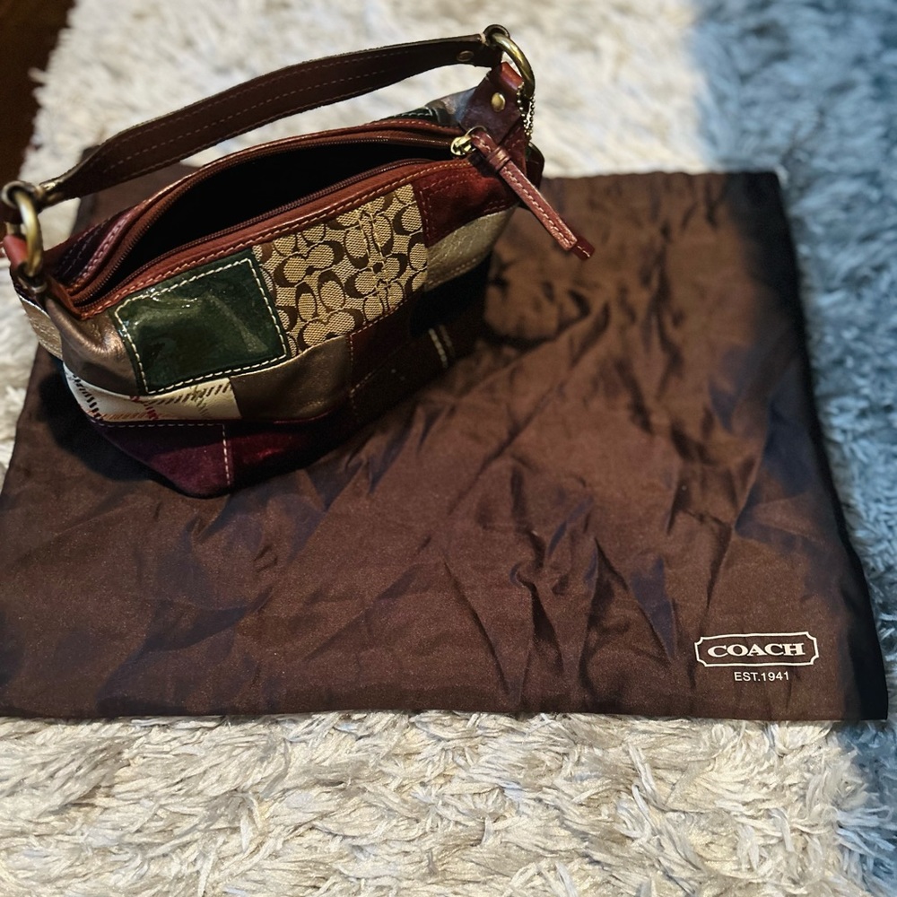 Coach Multicolor Patchwork Canvas/Leather/Suede and Calfhair Pochette. 9”W x 5”H